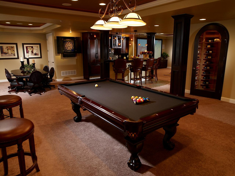 Finished basement with billiard table, bar & wine cooler