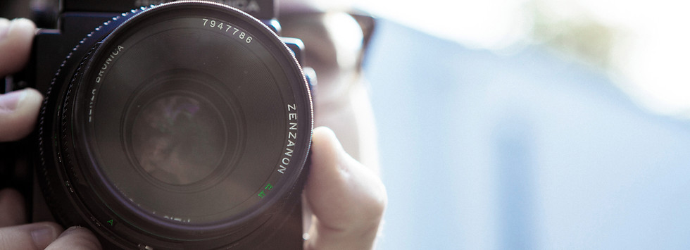 Photographer With Camera
