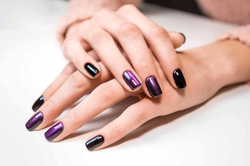 Hand on hand with nice manicure. Shellac