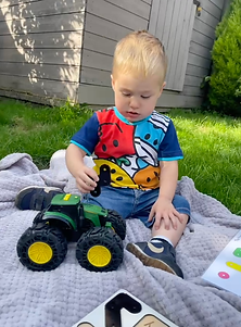 Photo of a child using PRIOR looking happy.