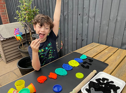 Photo of a child using PRIOR looking happy.