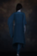 Thumbnail: Back view of slate blue asymmetric kurta with flowing silhouette