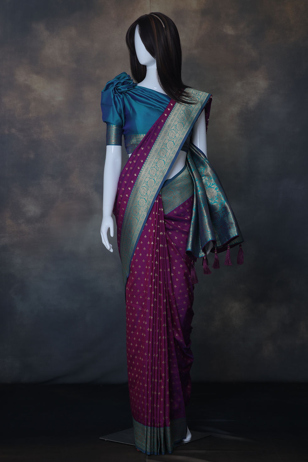 Thumbnail: Close-up of silk like fabric texture in magenta sea green saree