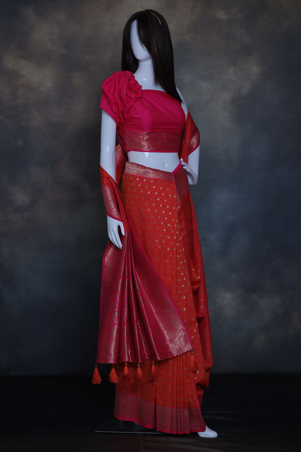 Thumbnail: Vivid red orange pink art silk saree laid out to show weave clarity
