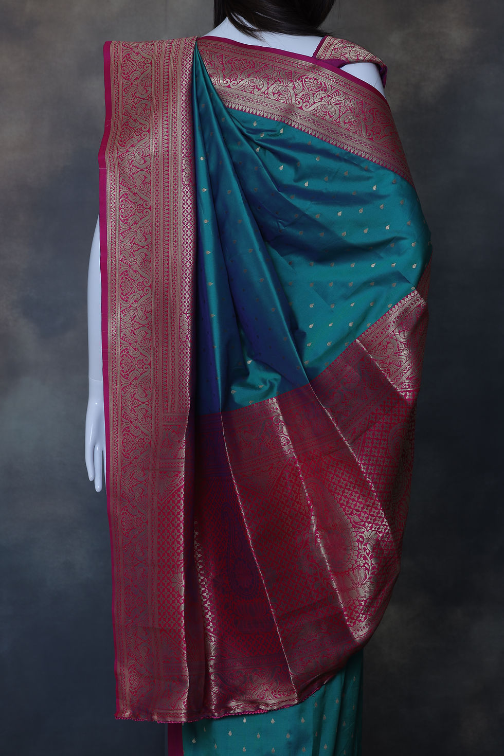 Thumbnail: Teal green pink art silk saree laid out to show weave clarity