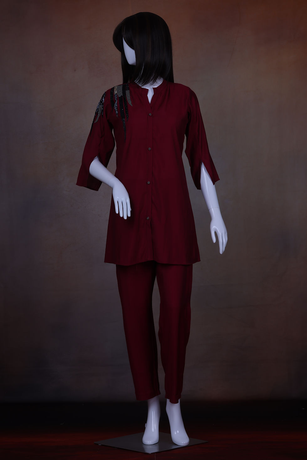 Thumbnail: Stand collar neckline highlighting structured finish