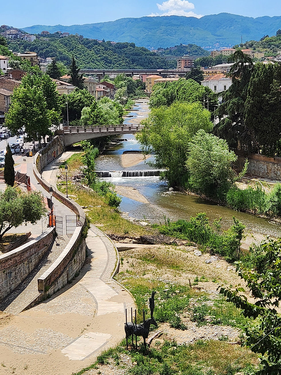 The Busento tributary and the sculpture of King Alaric at the bottom of the photo.