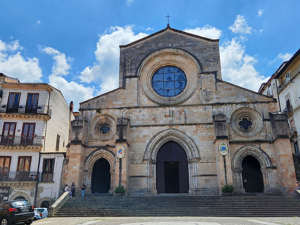 Exterior of Duomo di Santa Maria Assunta and the three rose windows.