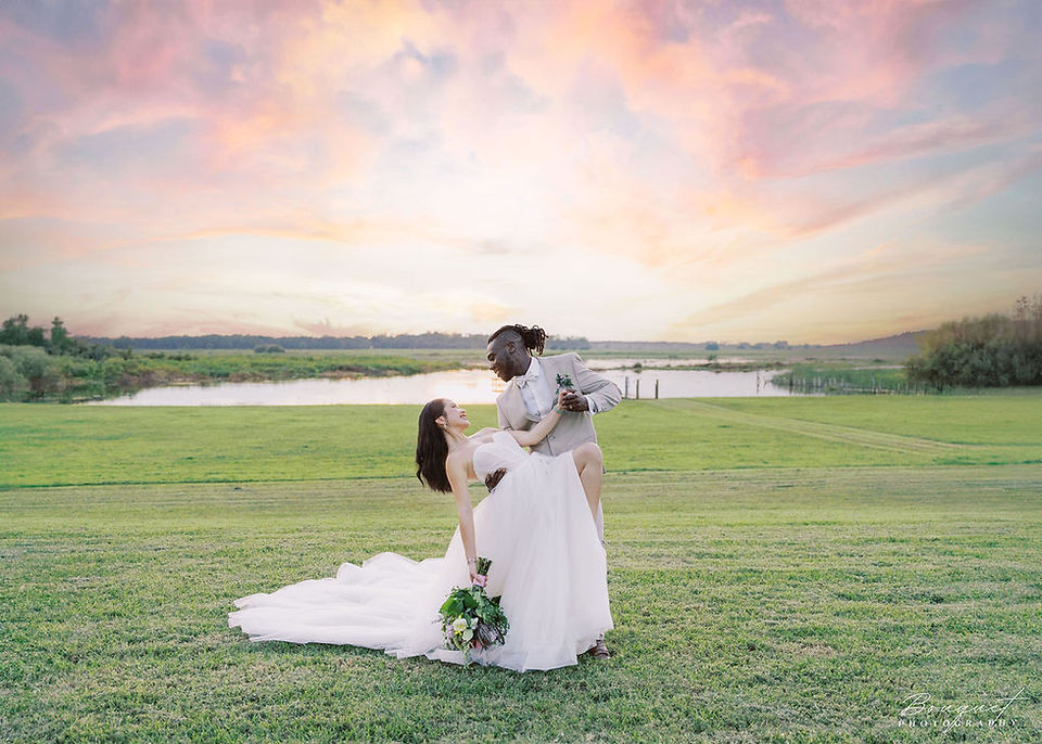 groom-dipping-bride-for-sunset-kiss-at-lavender-on-the-lake