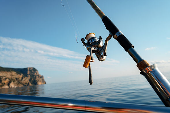 fishing-rod-on-a-sailboat-in-open-sea-close-up-2021-10-06-01-39-02-utc.jpg
