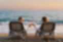 a-romantic-couple-sitting-in-lounge-chairs-on-summ-2022-11-11-18-07-04-utc.jpeg