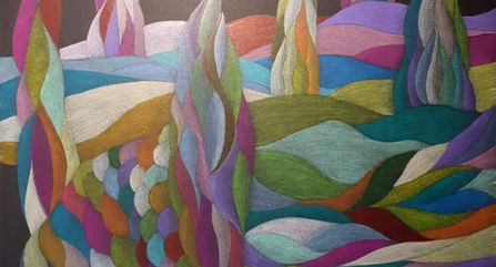 Abstract of horizontal and vertical shapes with a background of clouds.