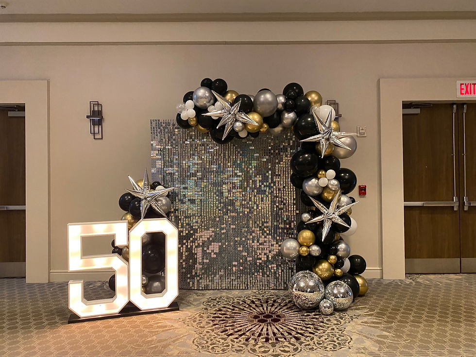 Silver Shimmer Wall for NYE at Eye Candy Balloons