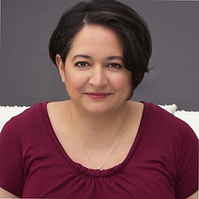 Amber Rahim smiling.
