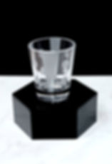 Etched shot glass with dots and stripes design