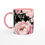 Thumbnail: Side view of floral ceramic mug with pink inside and handle