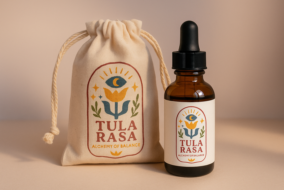 Amber dropper bottle and drawstring pouch with Tula Rasa logo and “Alchemy of Balance.”