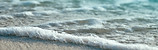 Ocean foam on a sand beach_edited_edited