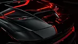 close-up-photo-of-a-black-vehicle-hood-with-red-light-reflections-after-ceramic-coating