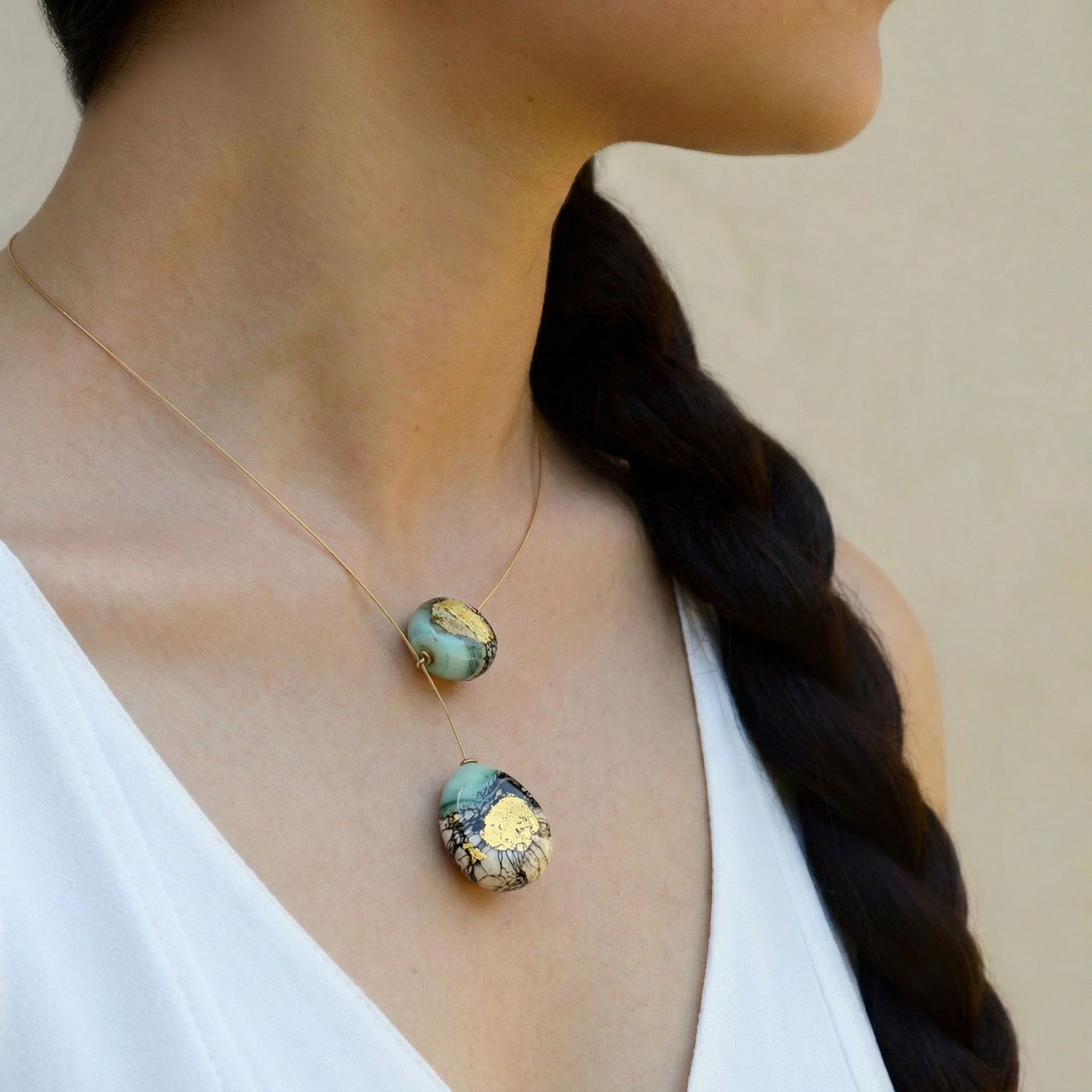 Asymmetric Earth necklace