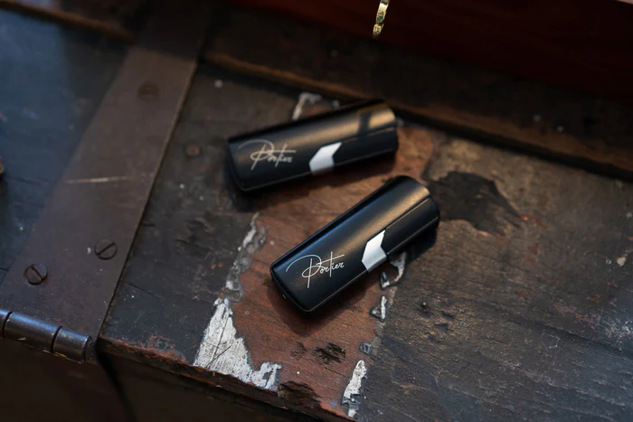 portier torch lighters on a wooden table