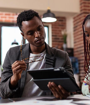 executive-managers-analyzing-marketing-statistics-tablet-computer-brainstorming-ideas-comp