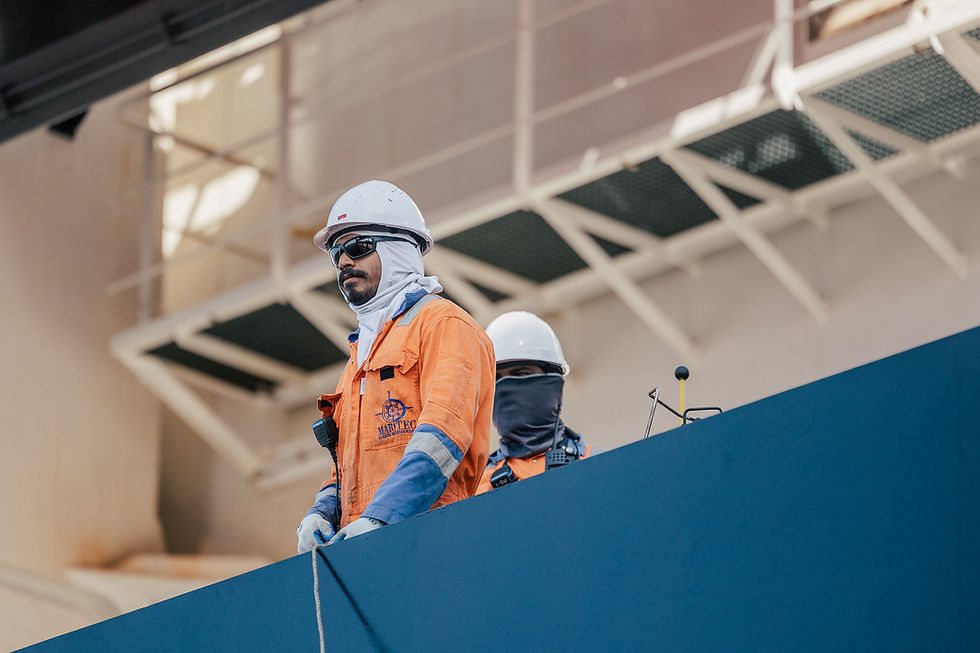 a photograph of a man working on a building site on the African continent