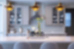 Modern kitchen architectural photography with gold pendant lights