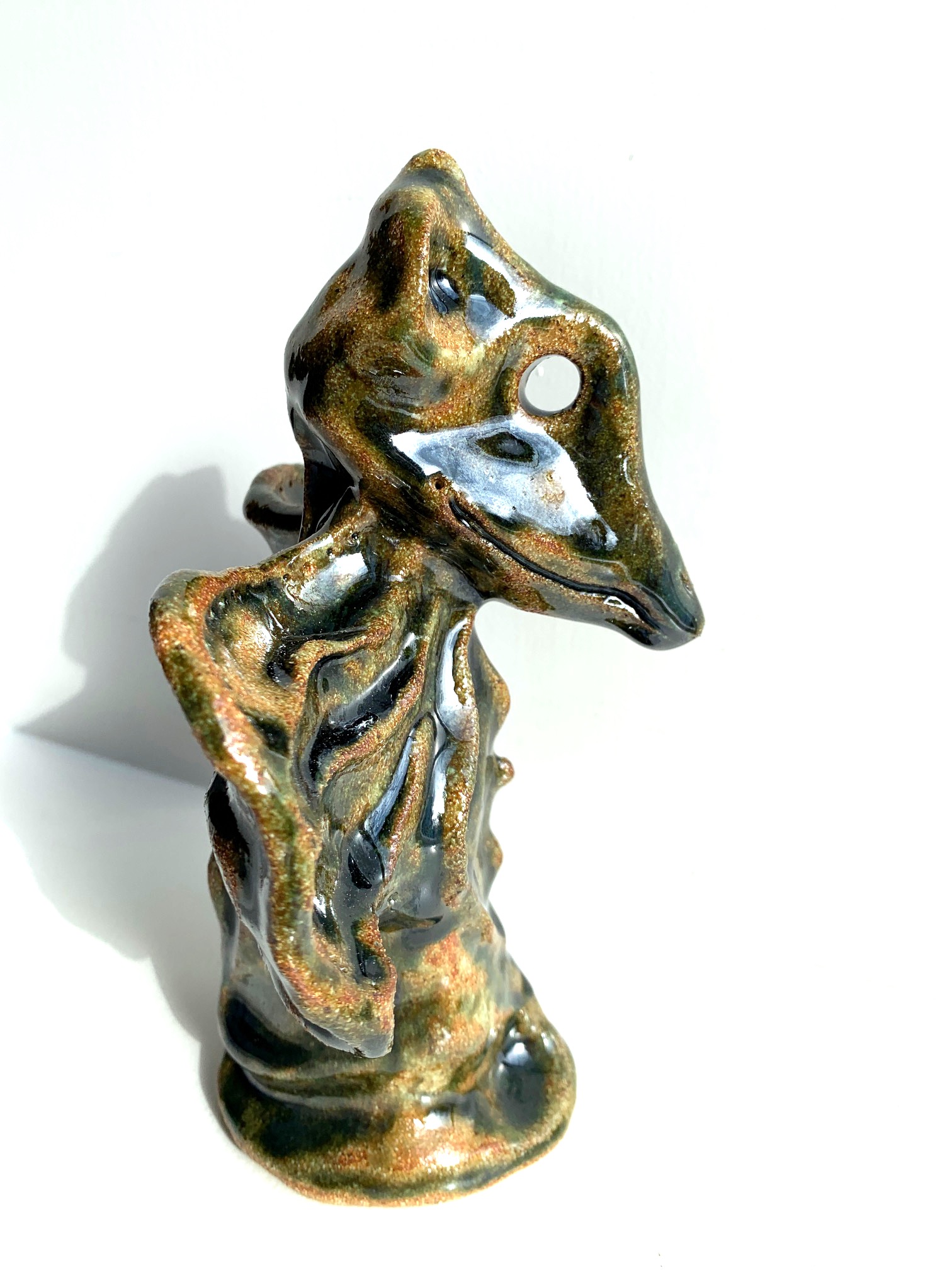 Bird lizard sculpture
