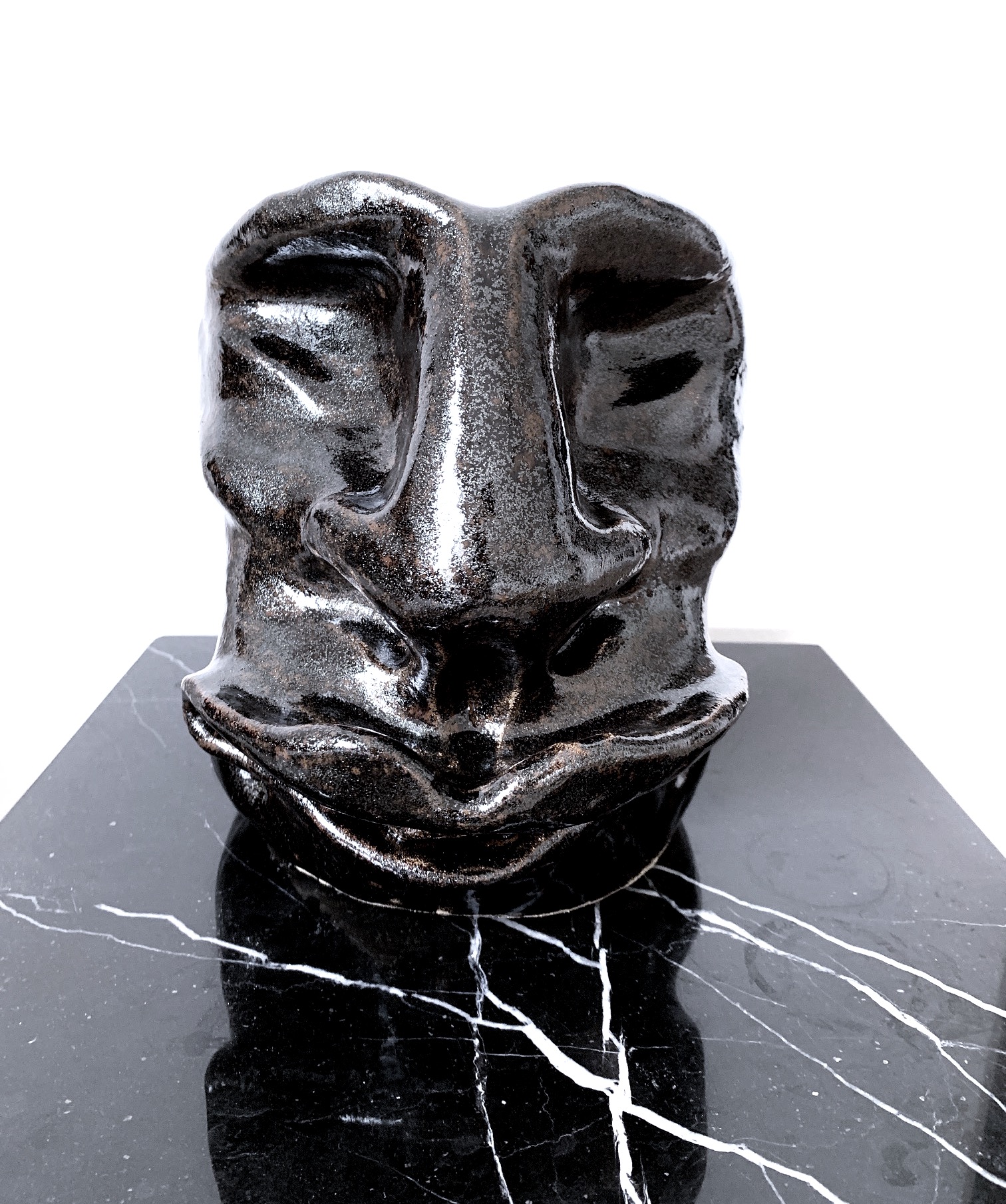 The man with the nose vase