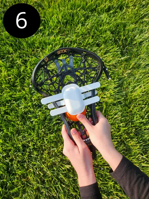 sixth and final step in installing a women's lacrosse propocket