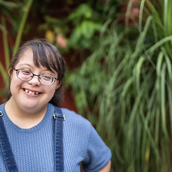 Smiling woman with Down syndrome