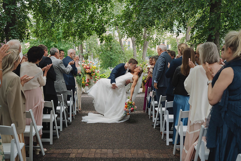 ceremony with tree coverage Nicollet Island Pavilion Wedding Venue in Minneapolis, Minnesota