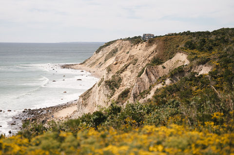 The Sullivan House on Block Island is a top-tier wedding venue, renowned for its sweeping ocean views and historic charm. Perched on a hill overlooking the harbor, this luxurious venue offers couples a unique setting, with a grand marquee tent for larger celebrations and intimate spaces like the Cypress Dining Room and wrap-around porch. Maddie Van, a wedding photographer, captures the elegance of The Sullivan House, showcasing high-end photography that complements the stunning coastal scenery and refined ambiance of this exclusive Block Island venue.