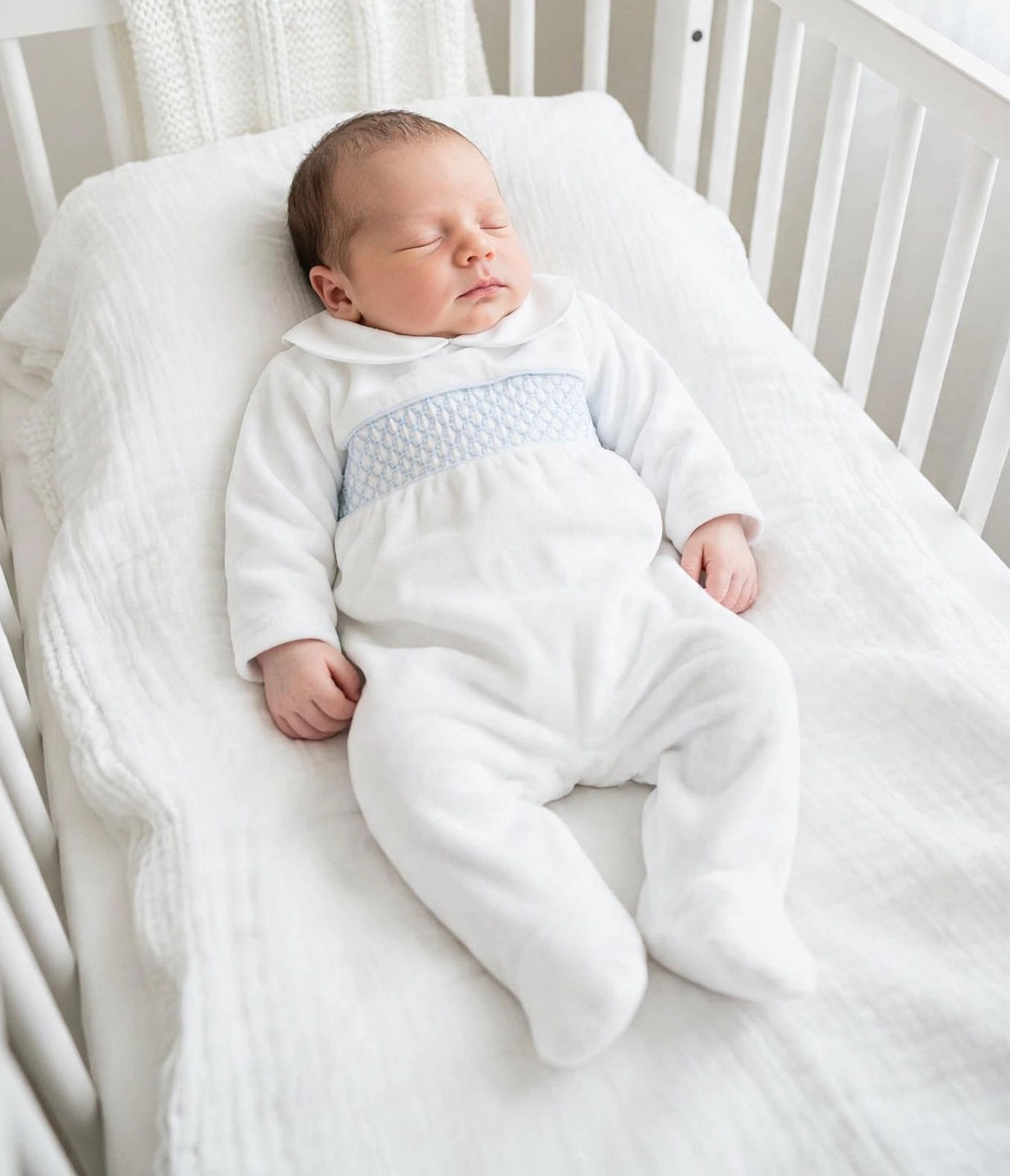 Sardon smocked sleepsuit
