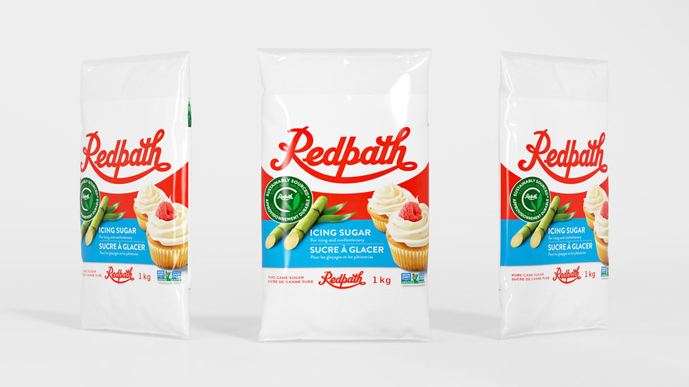 three bags of redpath icing sugar with cupcakes on them