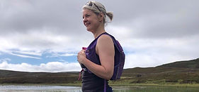 yoga and pilates teacher smiling in the outdoors