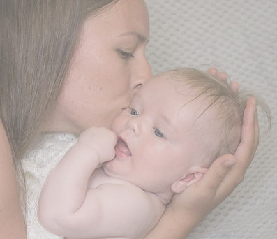 mummy cuddling baby
