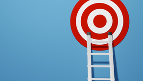 a step ladder leading to a target