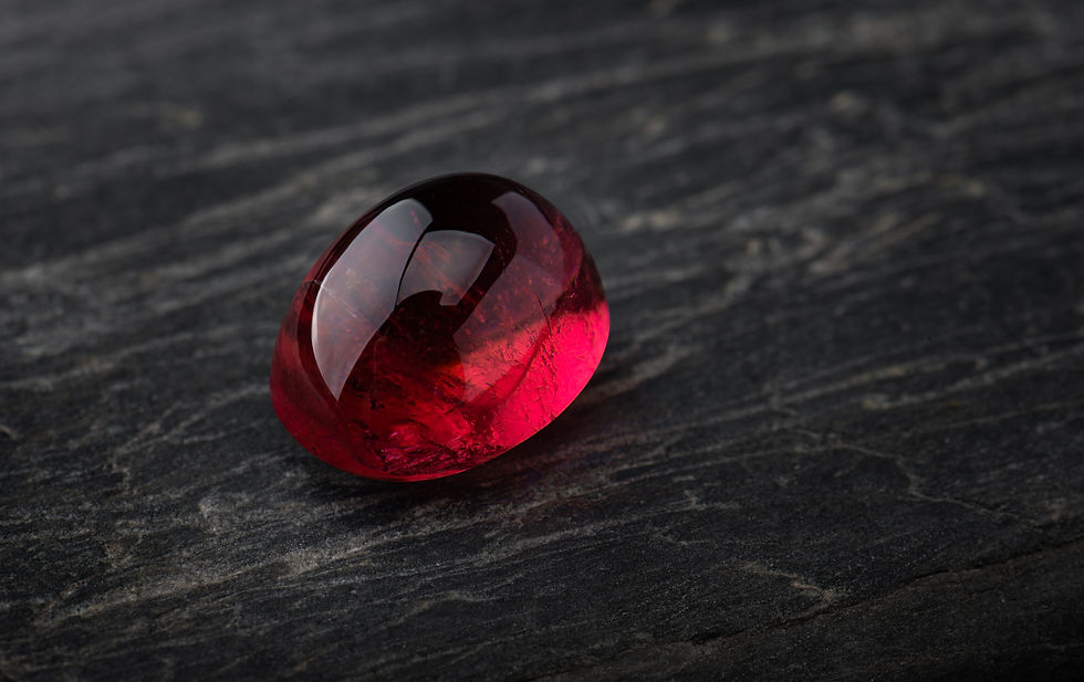 red-ruby-gemstone-with-dark-blackground.jpg