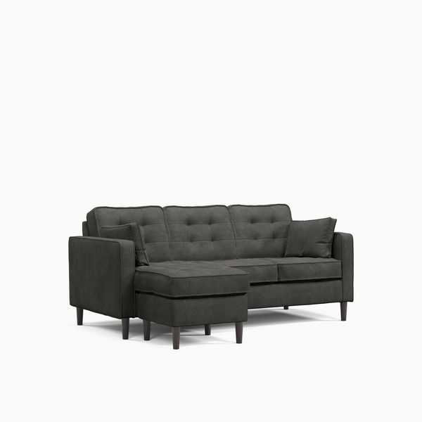 Thumbnail: Dark grey sectional sofa with tufted back cushions and ottoman.