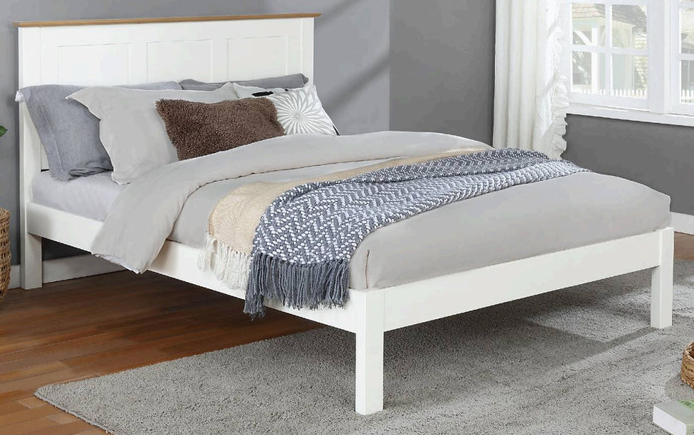 Thumbnail: White wooden bed frame with grey bedding and blue throw blanket.