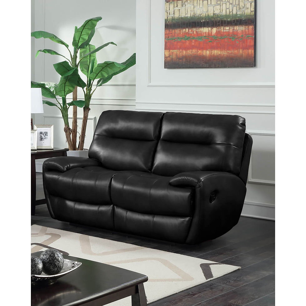 Thumbnail: Black reclining loveseat in a modern living room with plant and artwork.