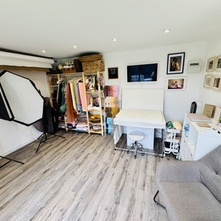 Cozy newborn photography setup with soft blankets and props at Rado Photo Studio, Gloucester photographer