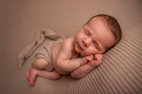 Vintage-inspired newborn photo with lace wrap – Cheltenham photographer