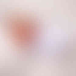 Classic newborn photography Gloucester – baby posed on a cosy beanbag.