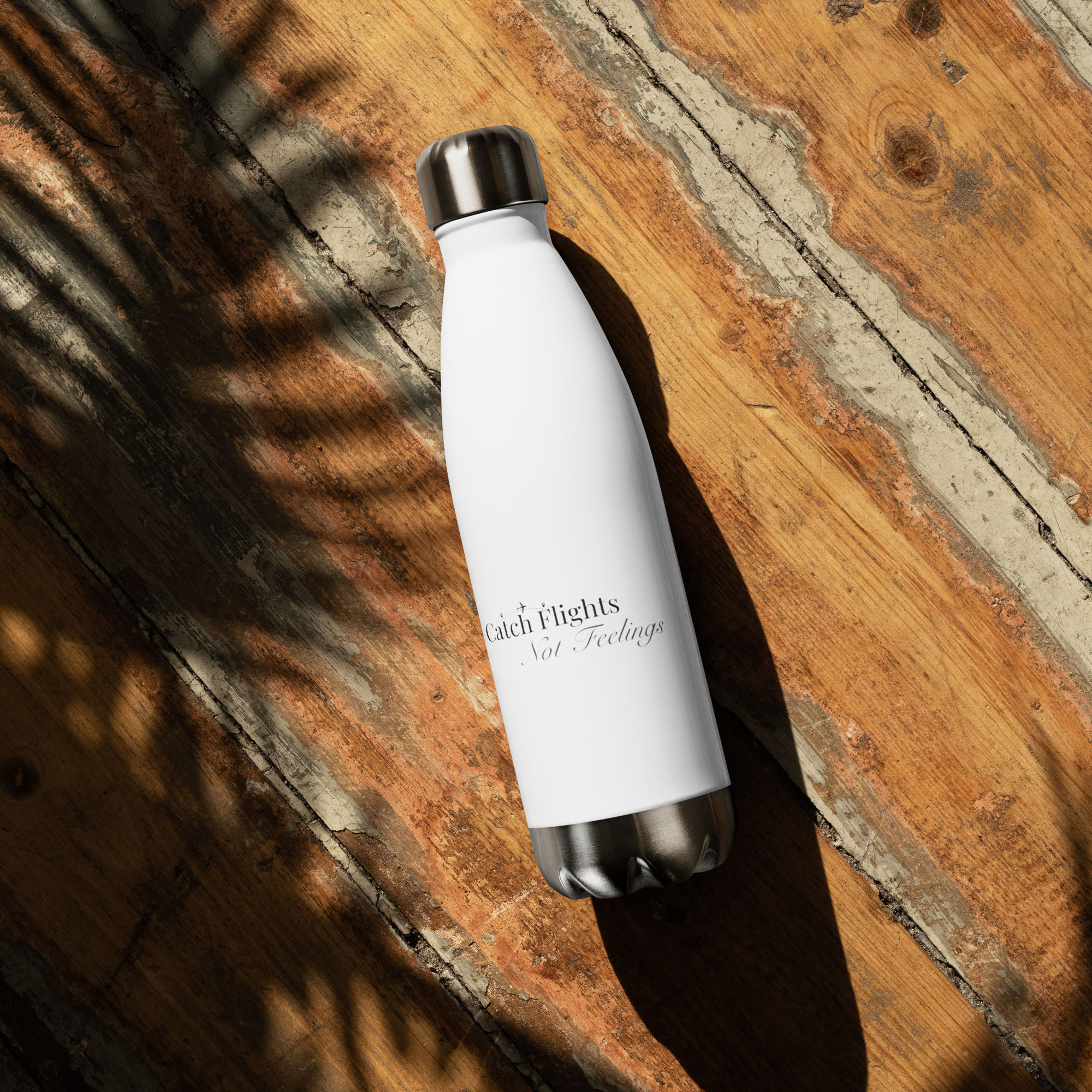Stainless steel water bottle: Catch Flights Not Feelings