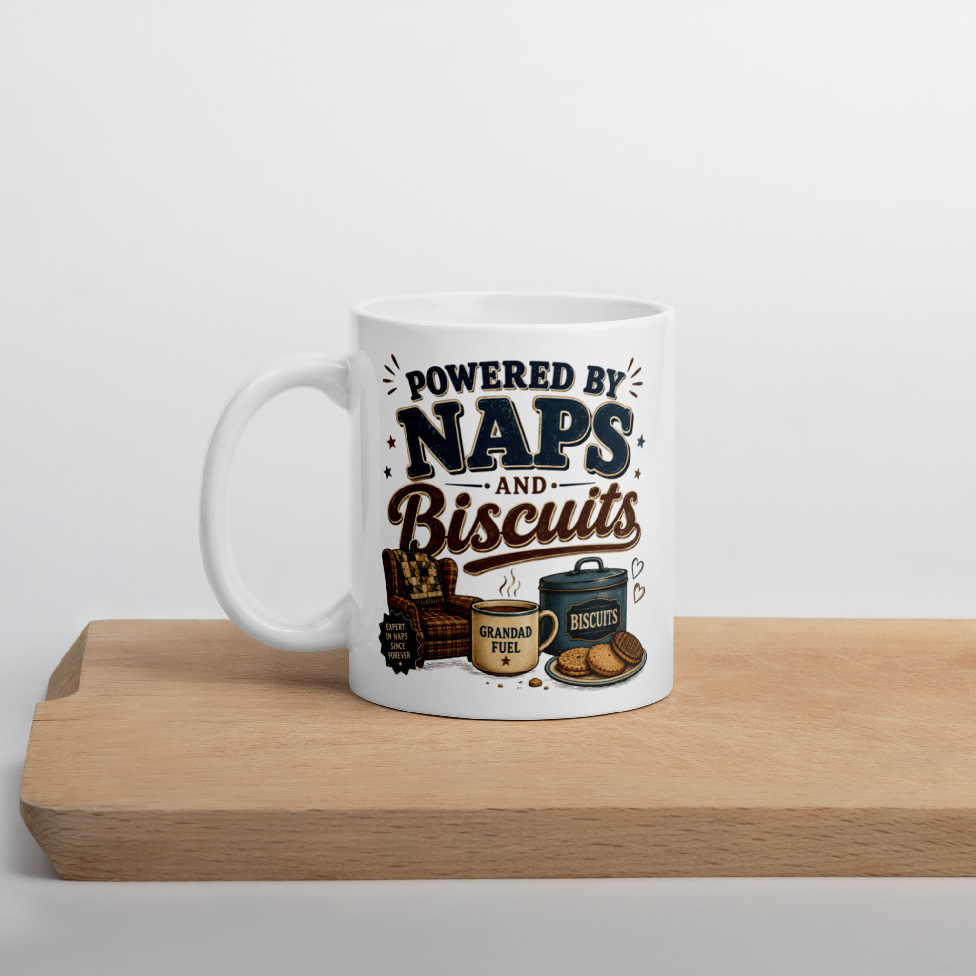 White glossy mug: Powered by naps and biscuits