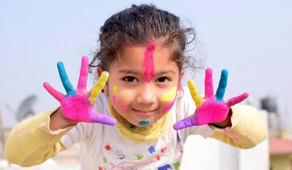 Girl with colorfull hands