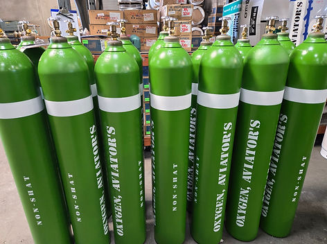 Freshly refurbished, striped, and stenciled Aviator's Oxygen cylinders for the military